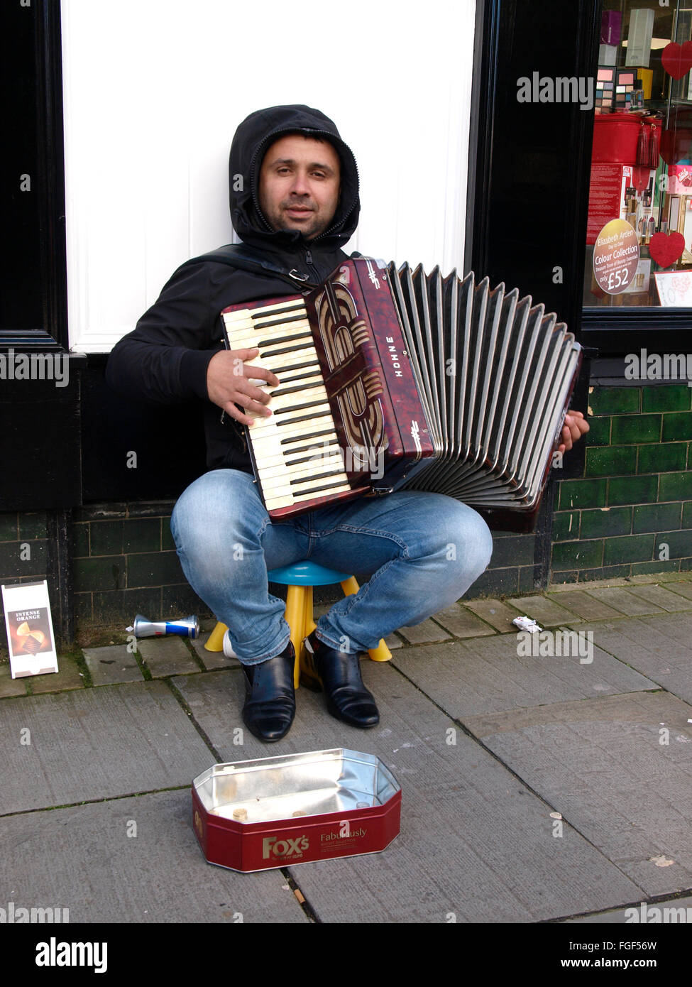 Romanian immigrant busking on the streets of Havant, Hampshire, UK Stock Photo