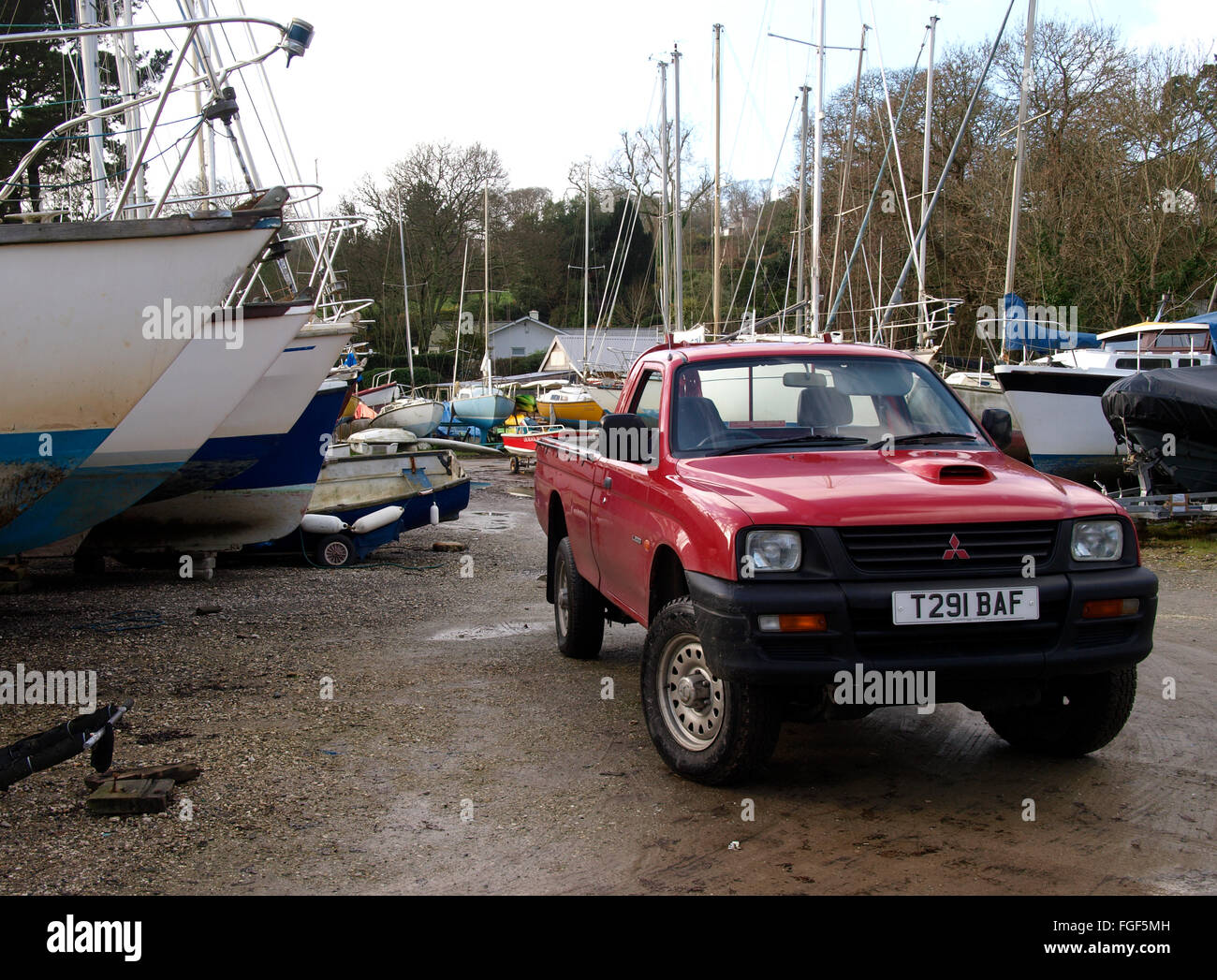 Mitsubishi L200 pick up truck in a boatyard, Cornwall, UK Stock Photo