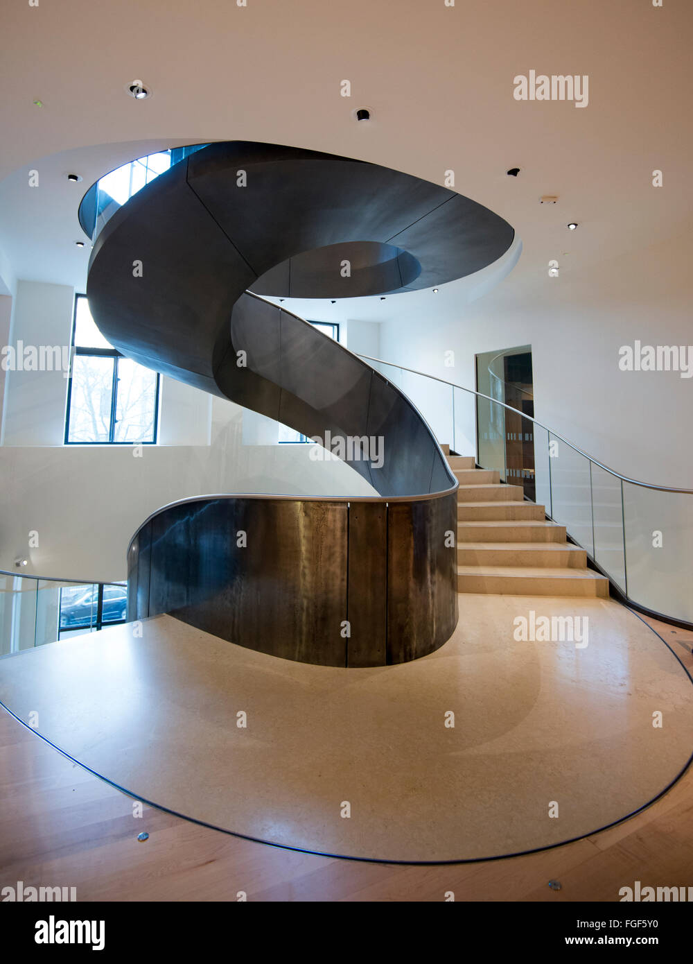 Spiral staircase inside the building that houses the Wellcome Collection, London England UK Stock Photo