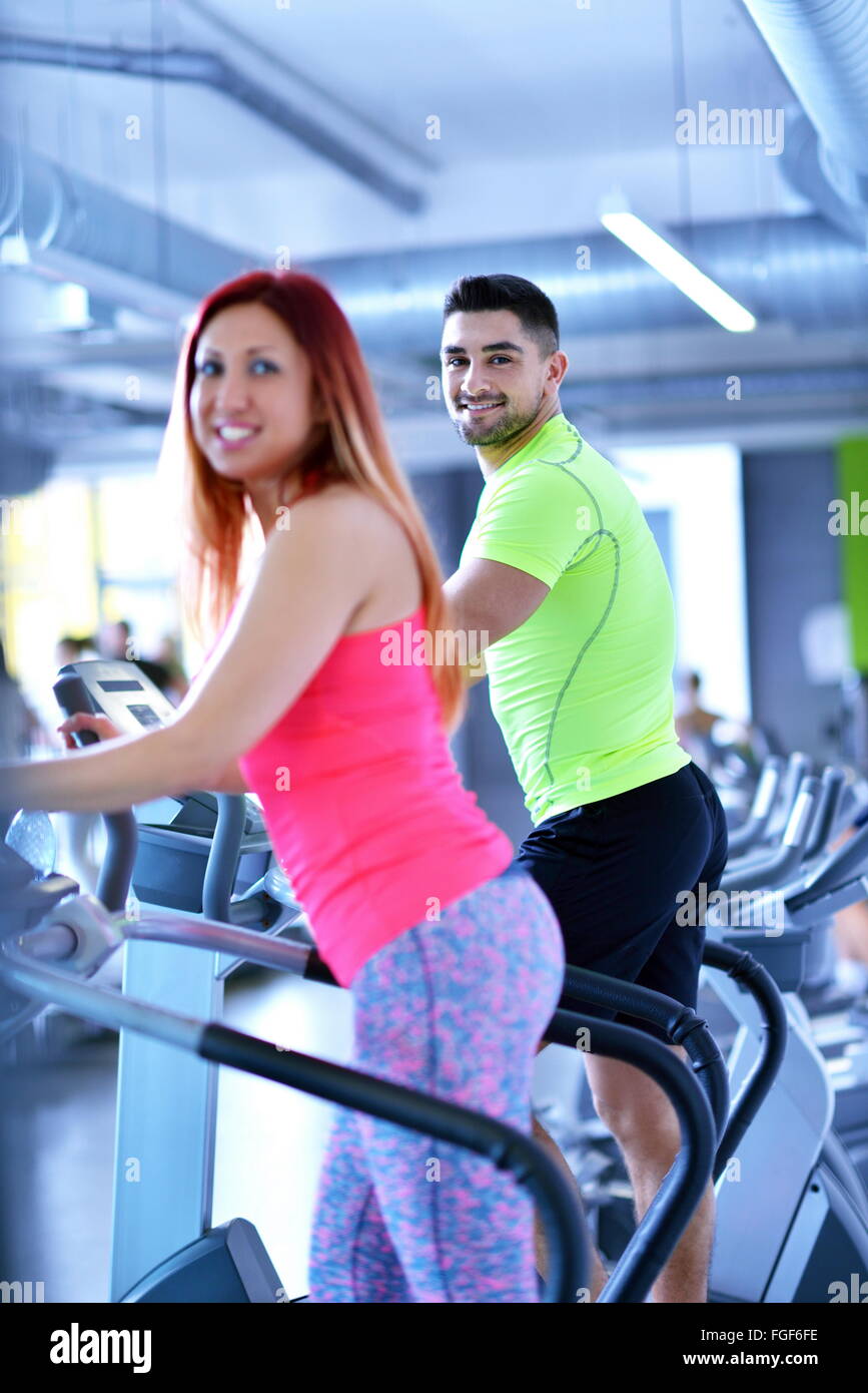 Group of people running on treadmills Stock Photo