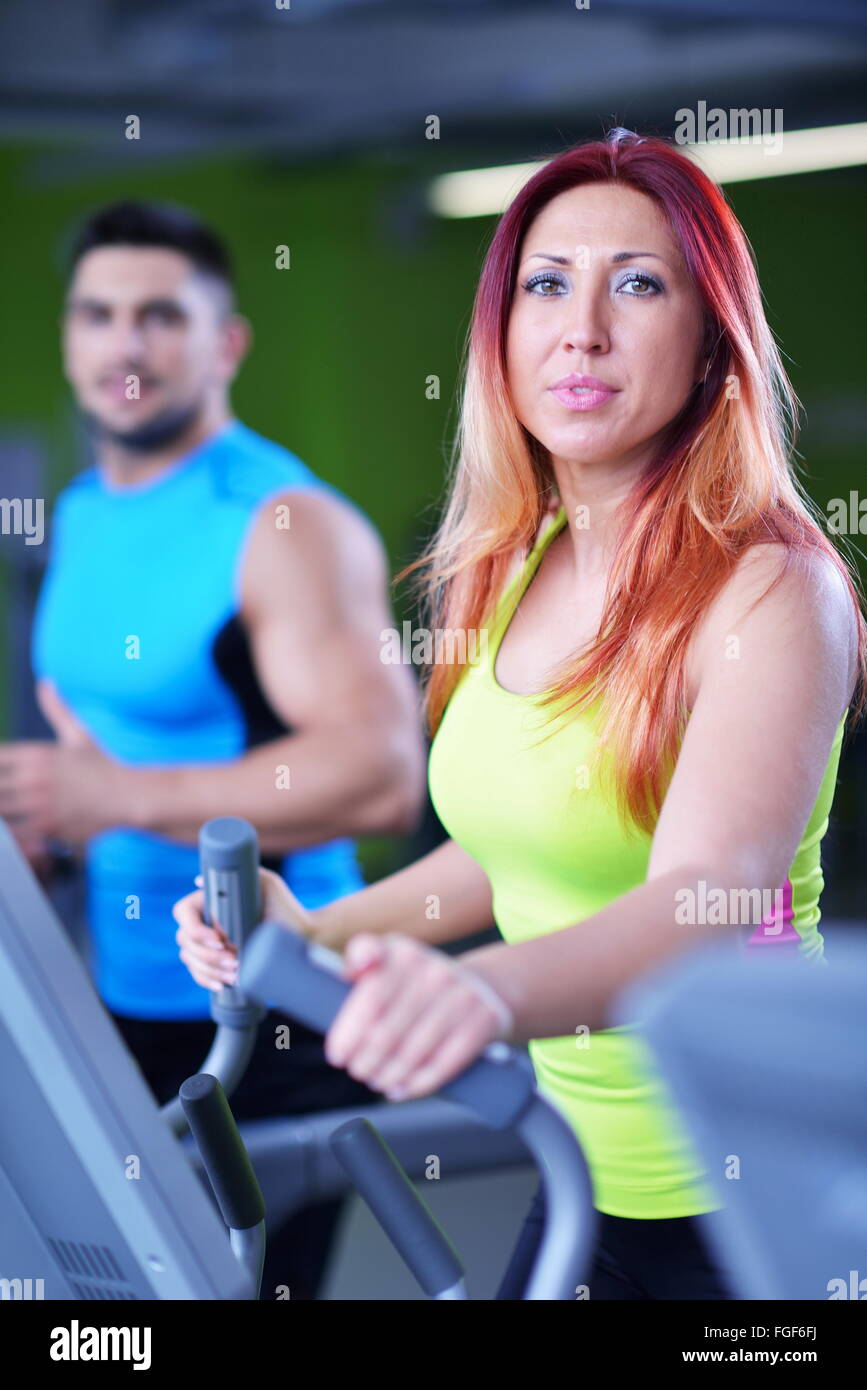 Group of people running on treadmills Stock Photo