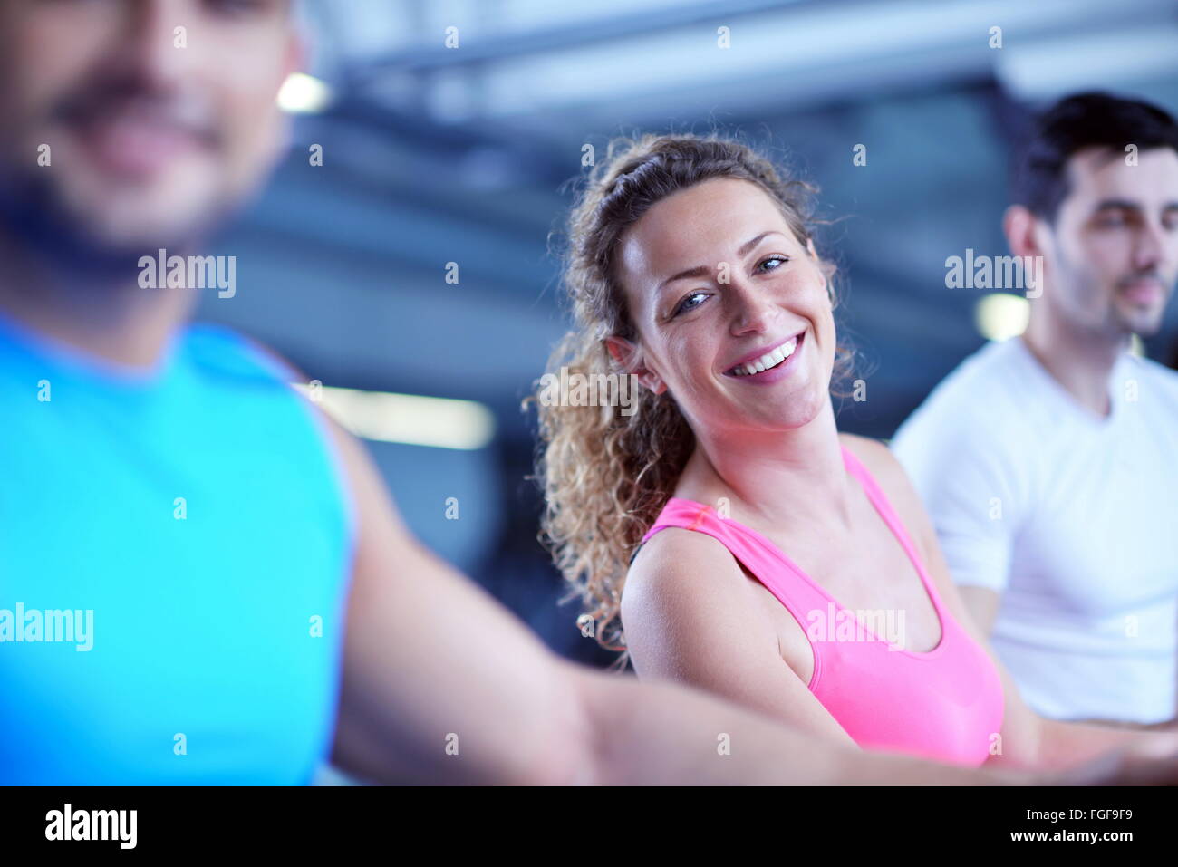 Group of people running on treadmills Stock Photo