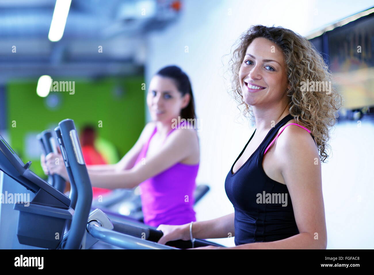 Group of people running on treadmills Stock Photo - Alamy