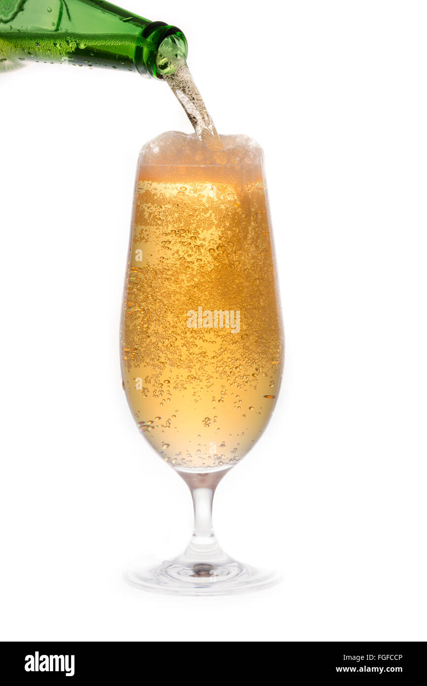 Beer Pouring from Bottle into Glass Stock Photo Alamy