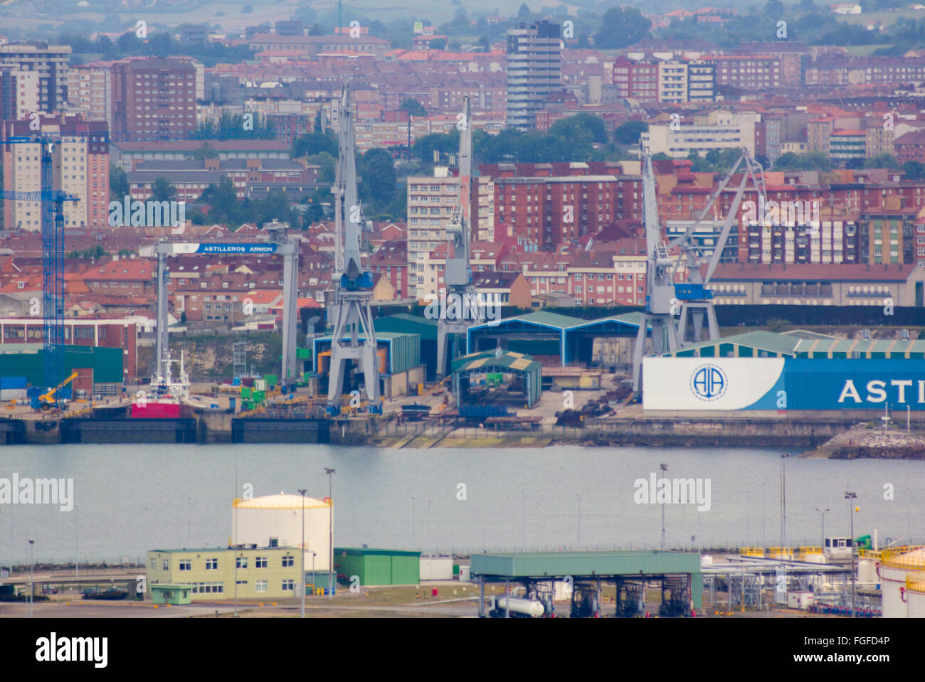 Huge cranes at a port charge Stock Photo
