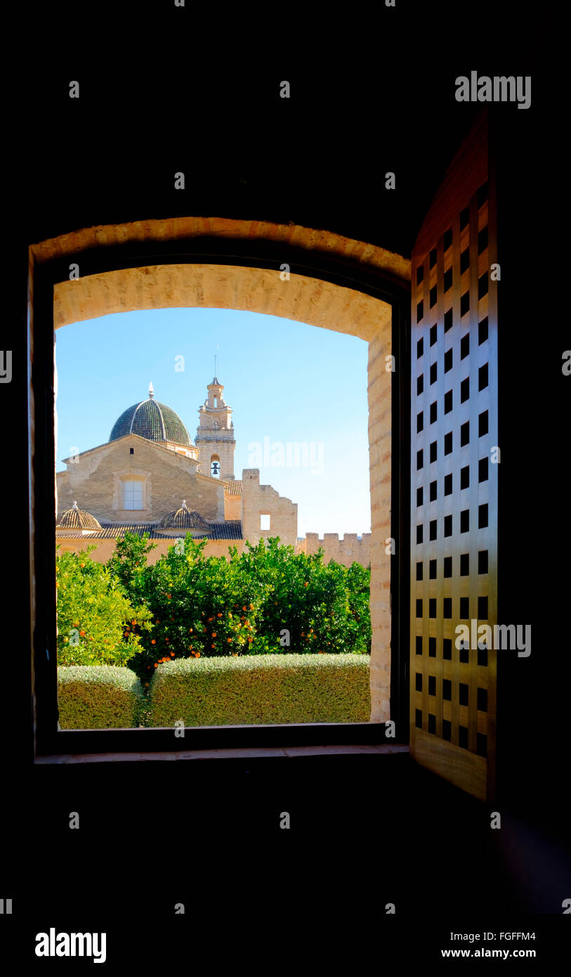 Cistercian Monastery of Saint Mary of Valldigna in Simat Spain through an open window Stock Photo