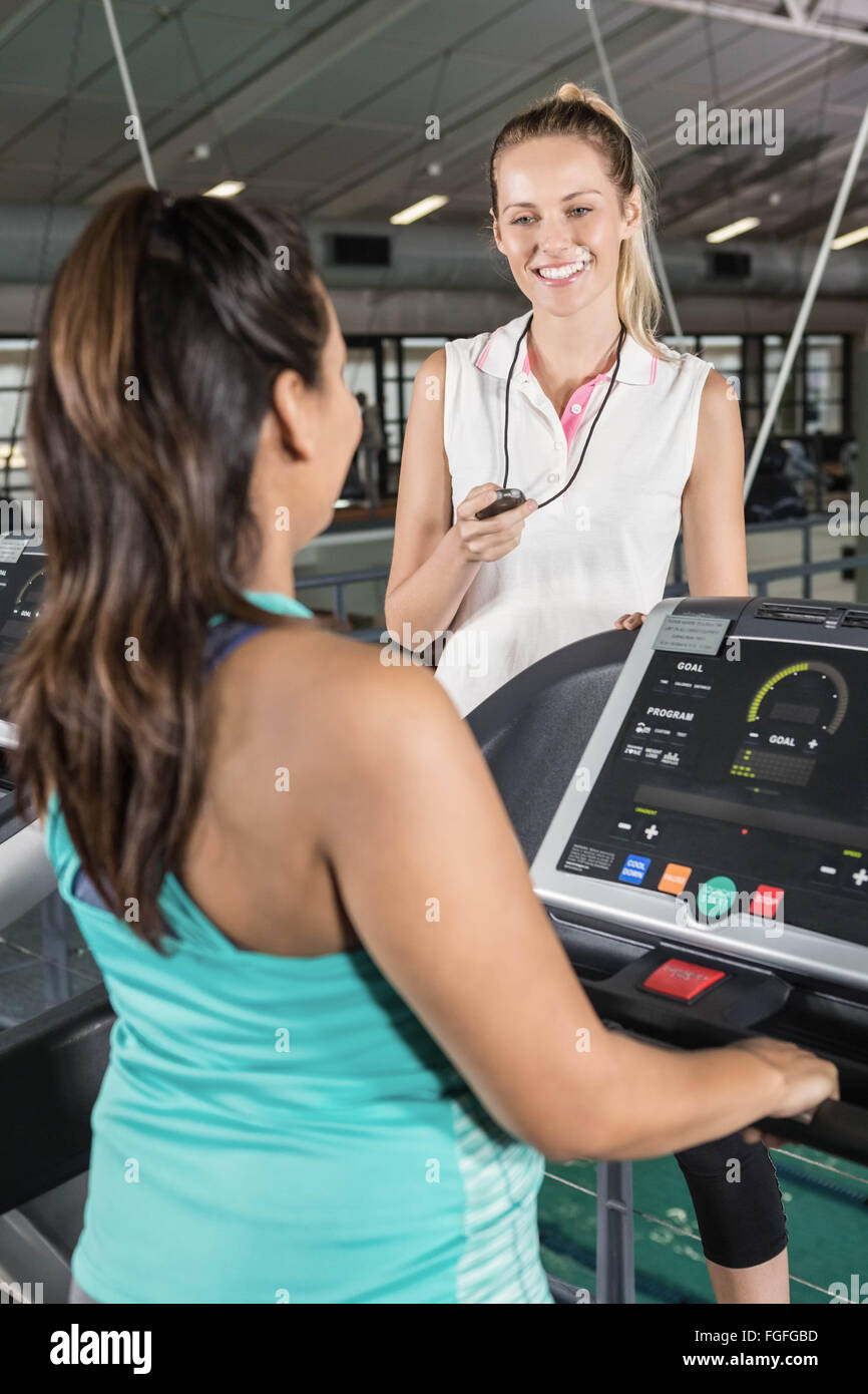 Trainer using stopwatch Stock Photo Alamy