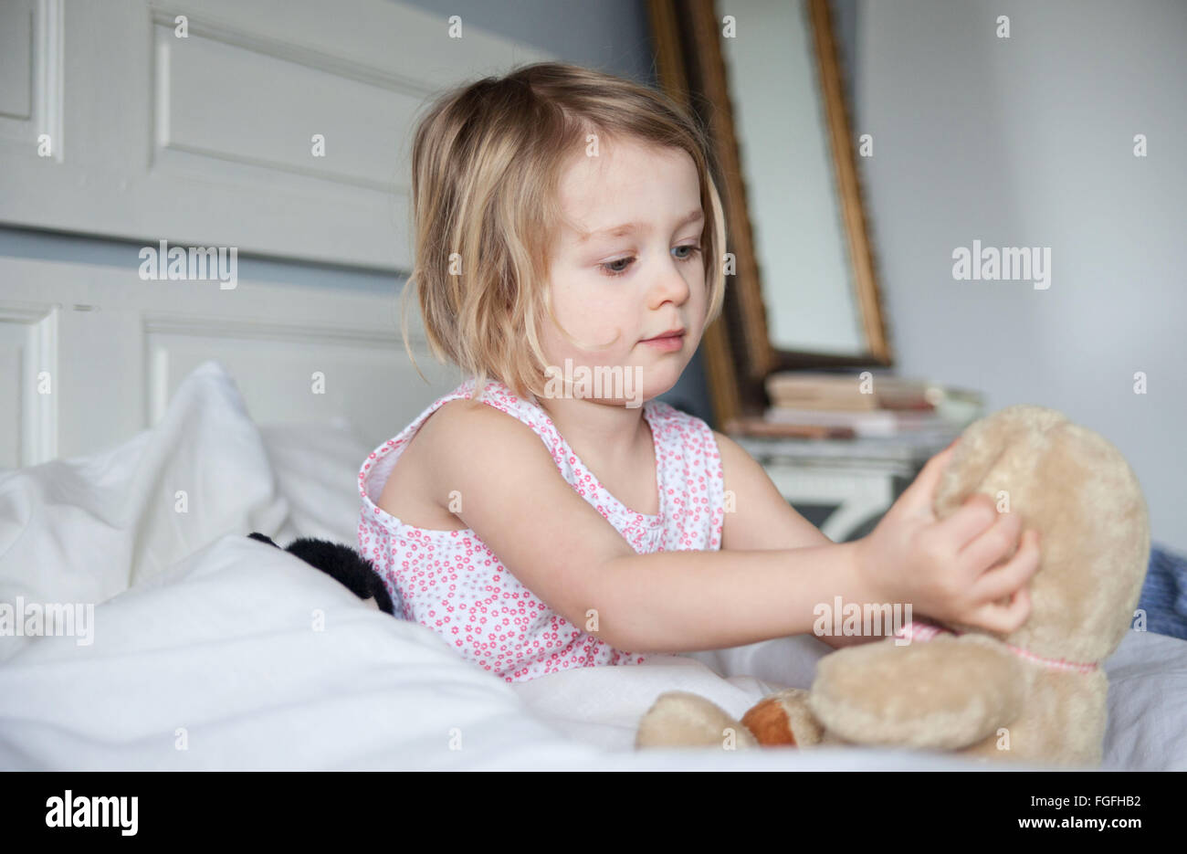 comfy in bed Stock Photo Alamy