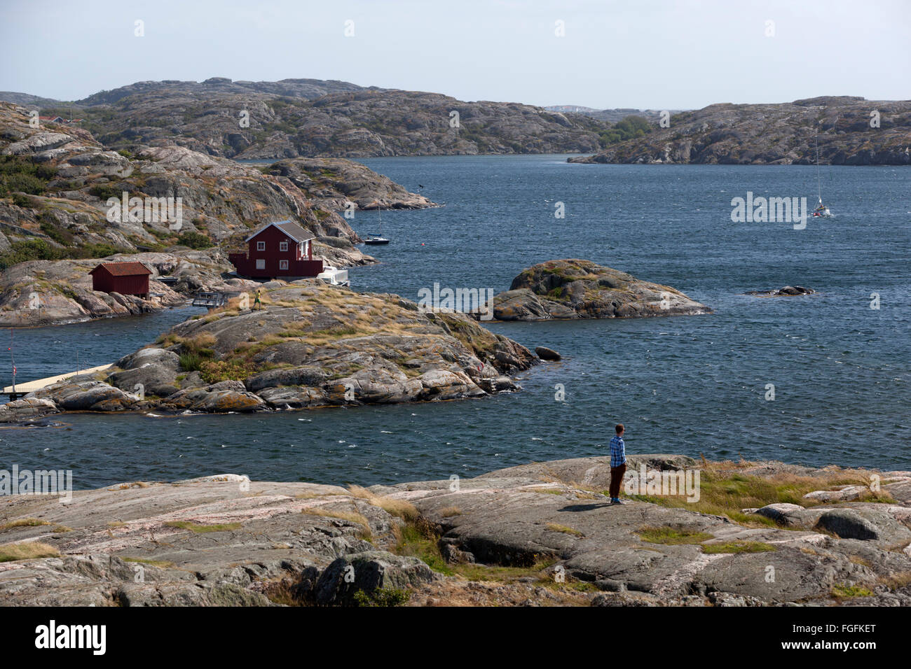 Yacht sailing through archipelago, Skärhamn, Tjörn, Bohuslän Coast, southwest Sweden, Sweden, Scandinavia, Europe Stock Photo