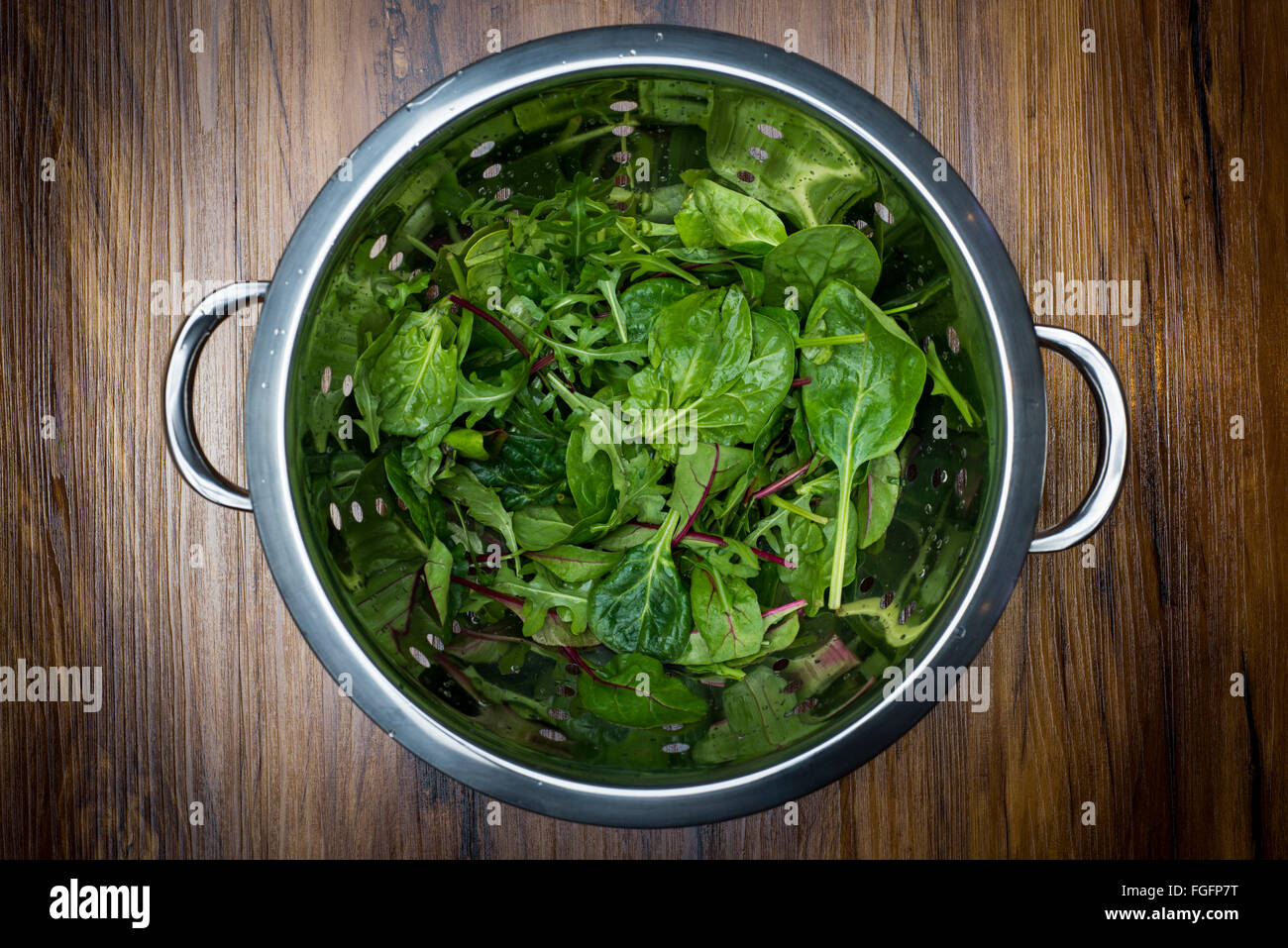 mixed salad leaves in a colander Stock Photo
