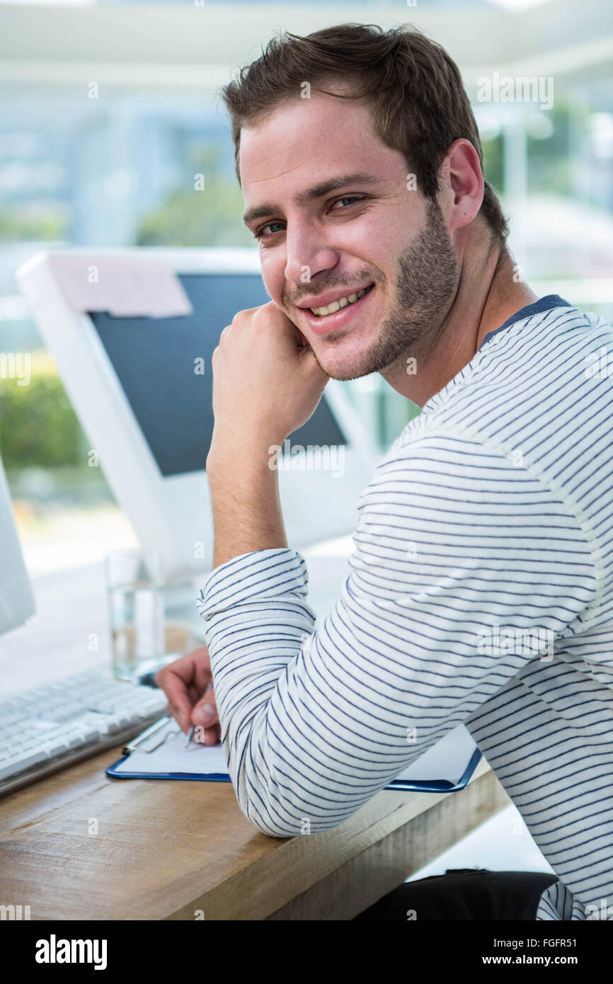 Working handsome man taking hi-res stock photography and images - Alamy