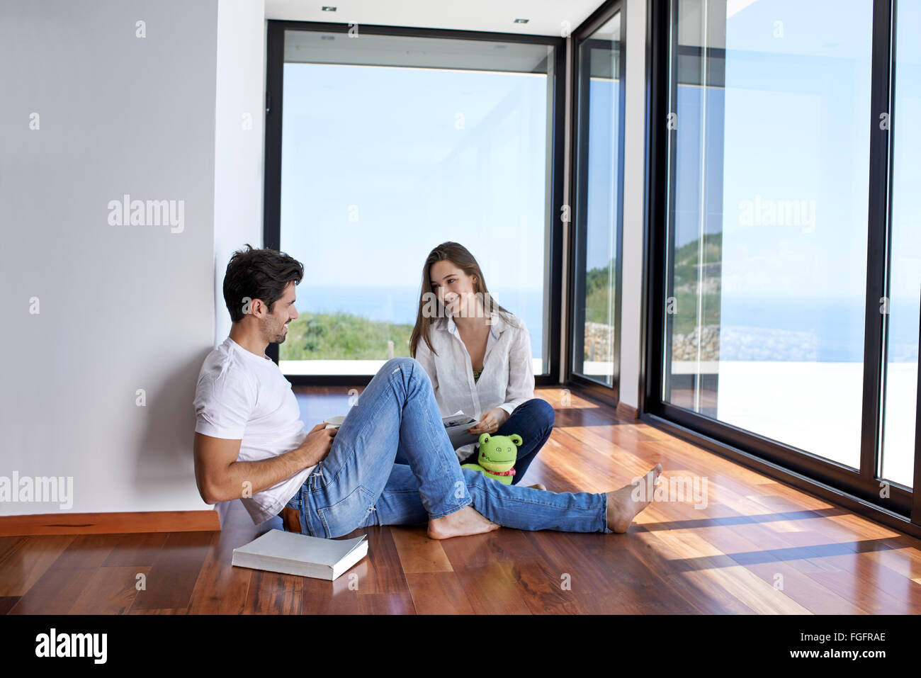 relaxed young couple at home staircase Stock Photo