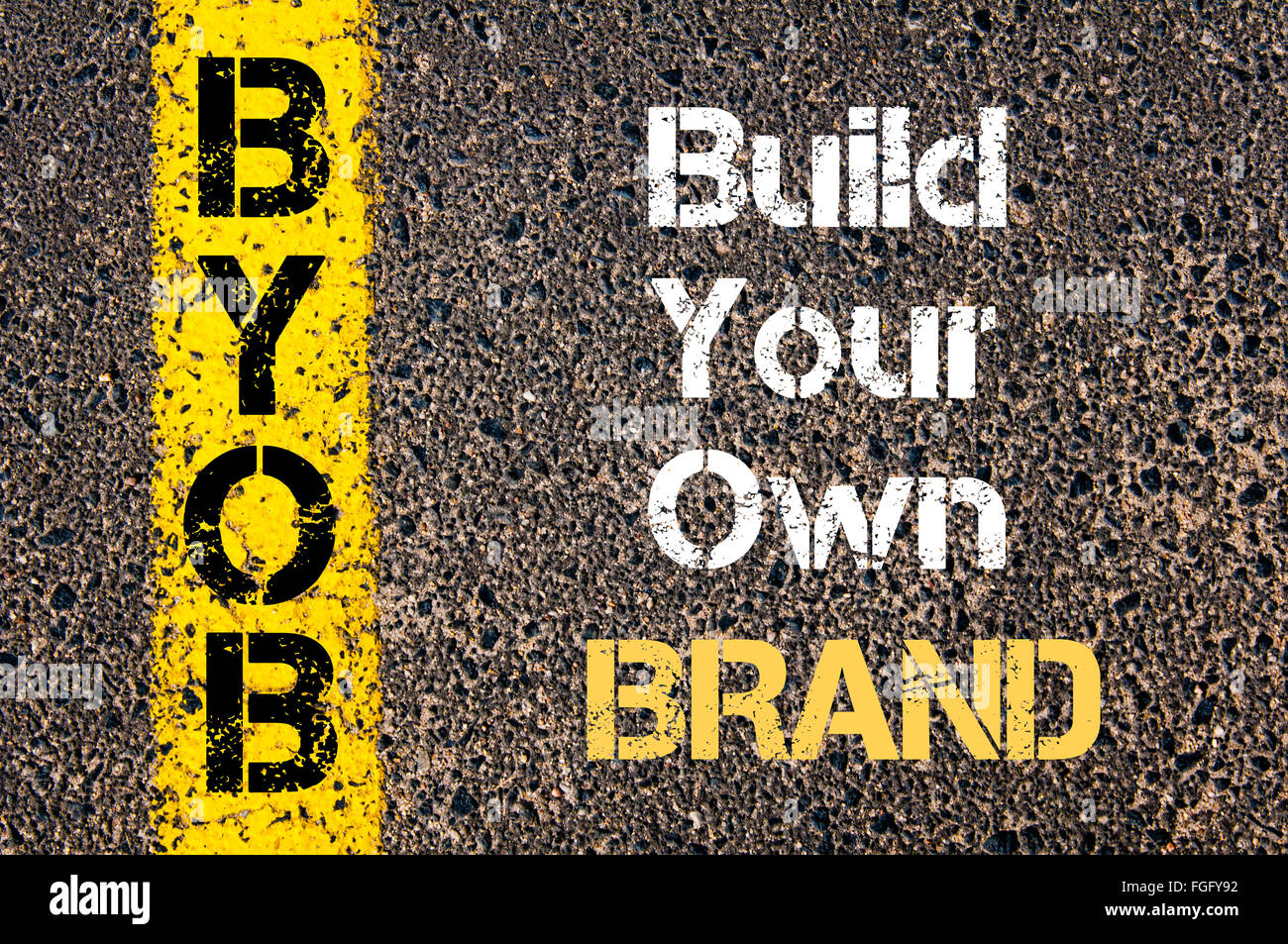 Concept image of Business Acronym BYOB Build Your Own Brand written over road marking yellow paint line Stock Photo