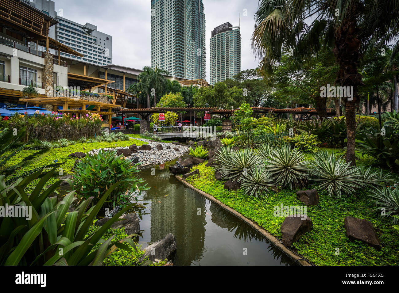 Gardens and skyscrapers at Greenbelt Park, in Ayala, Makati, Metro Manila,  The Philippines Stock Photo - Alamy