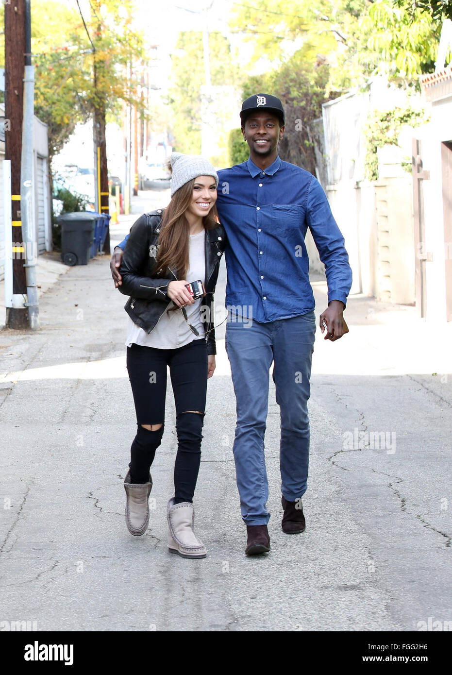 'Twilight' and 'X-Men' actor Edi Gathegi seen engrossed in a phone call while out in Beverly Hills, and then joined by his girlfriend Courtney B. Turk  Featuring: Edi Gathegi, Courtney B. Turk Where: Los Angeles, California, United States When: 15 Jan 2016 Stock Photo