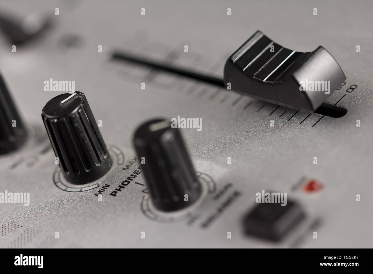 Knobs and fader of a DJ mixer Stock Photo Alamy