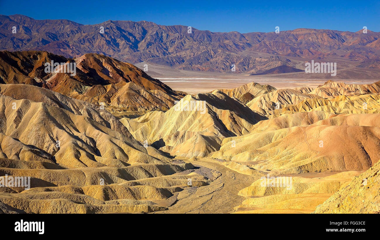 The view from Zabriskie Point in Death Valley National Park shows rugged hills formed by erosion. Stock Photo
