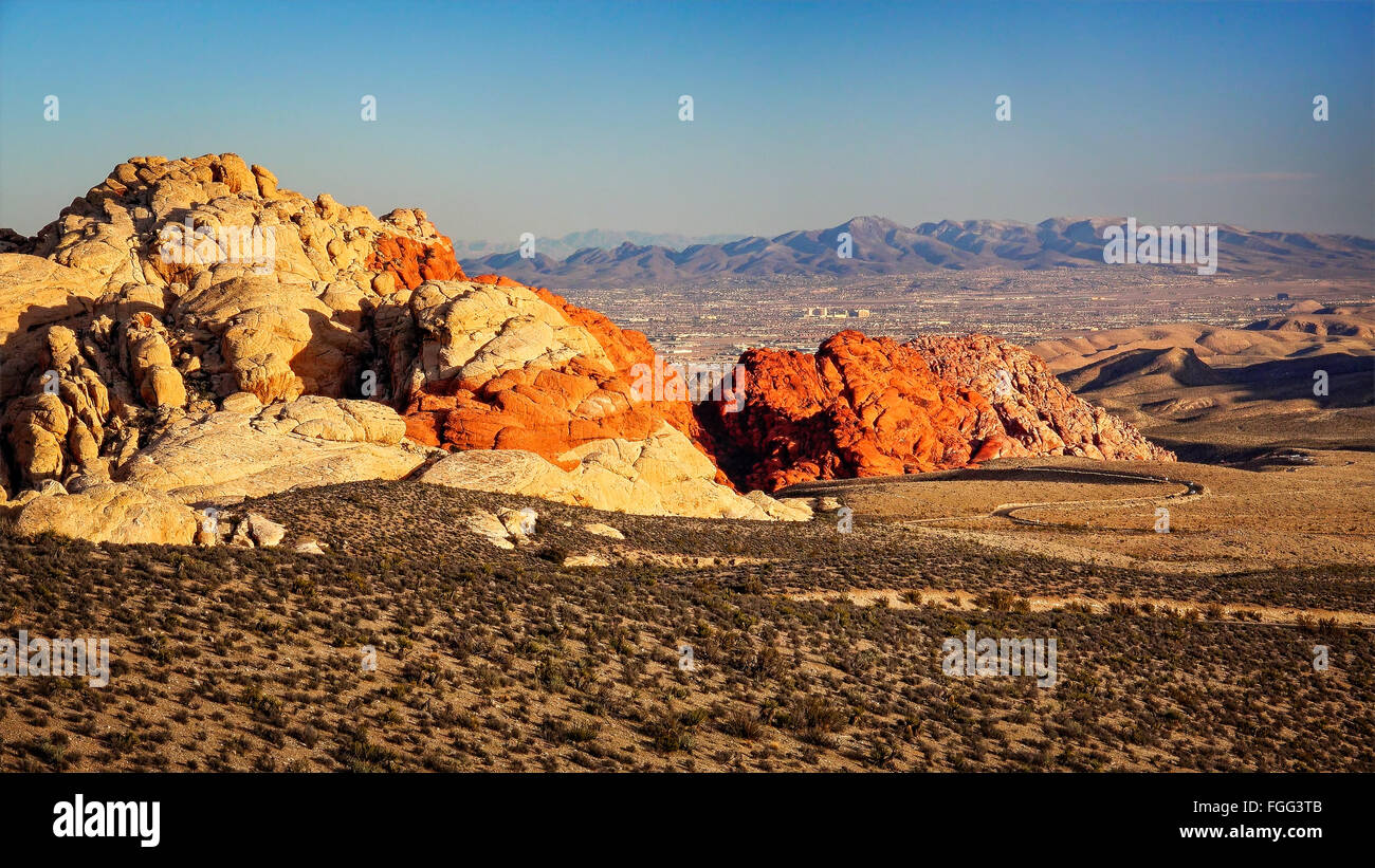 Red Rock Canyon with a view of Las Vegas in the distance Stock Photo