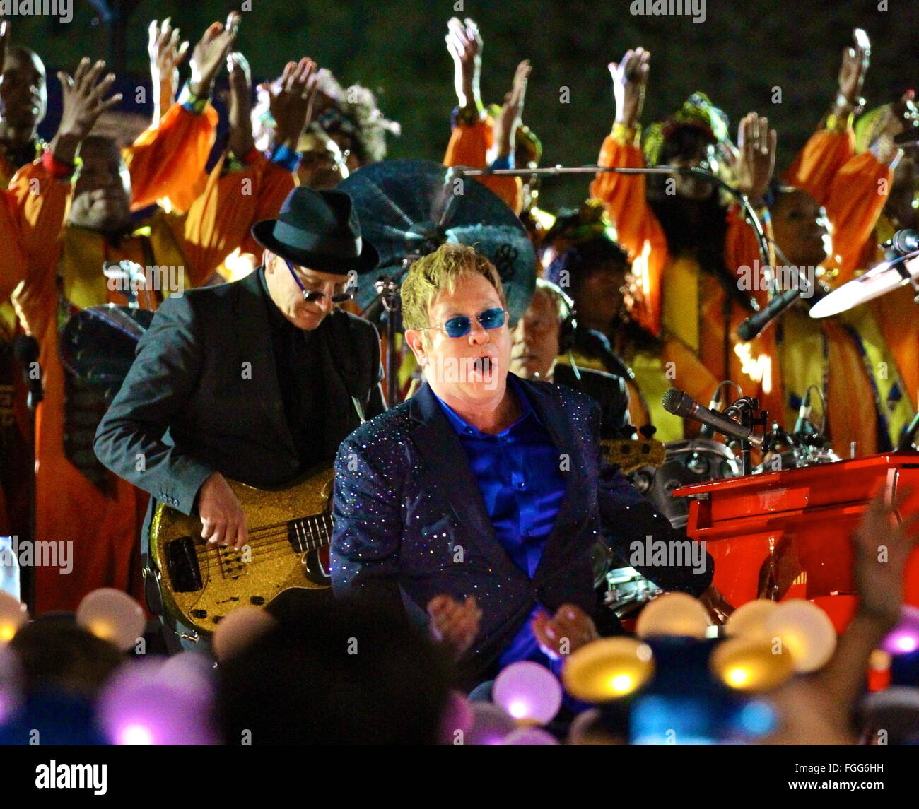 Elton John performing live in concert in front of the Sleeping Beauty