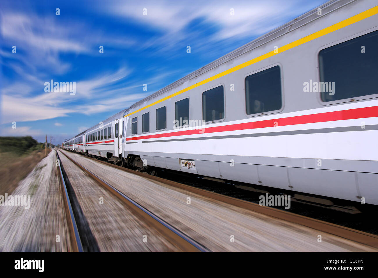 High speed gray commuter train, motion blured Stock Photo