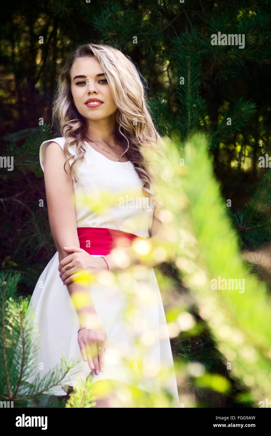 Summer photo smiling girl in a white dress Stock Photo - Alamy