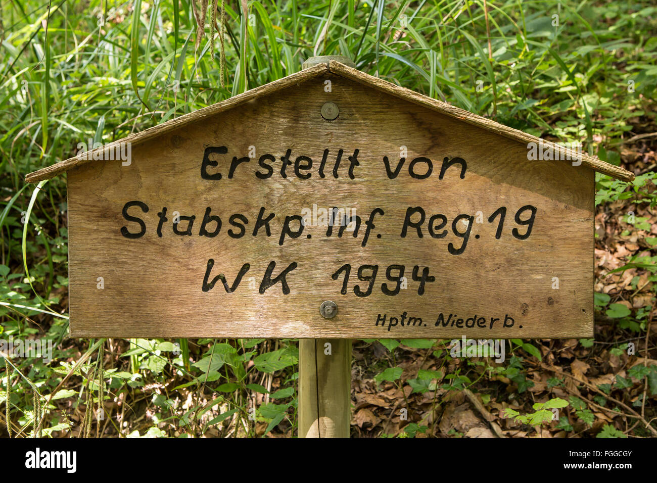Wooden plaque with inscription Stock Photo