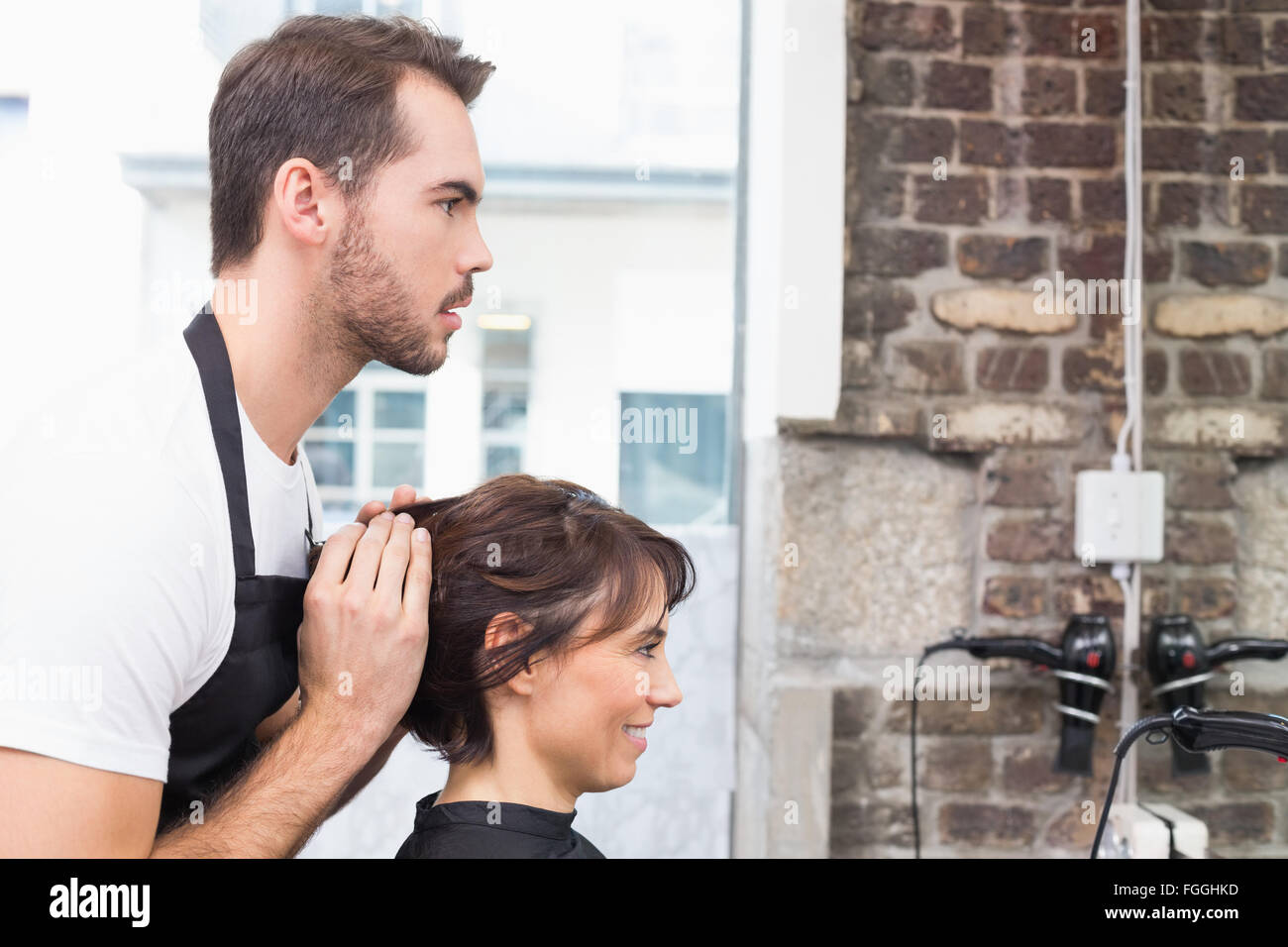 Pretty at her hair appointment Stock Photo Alamy