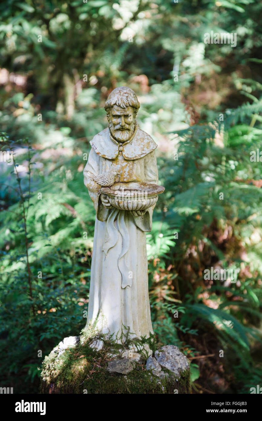 Religious statue in a forest in California Stock Photo Alamy