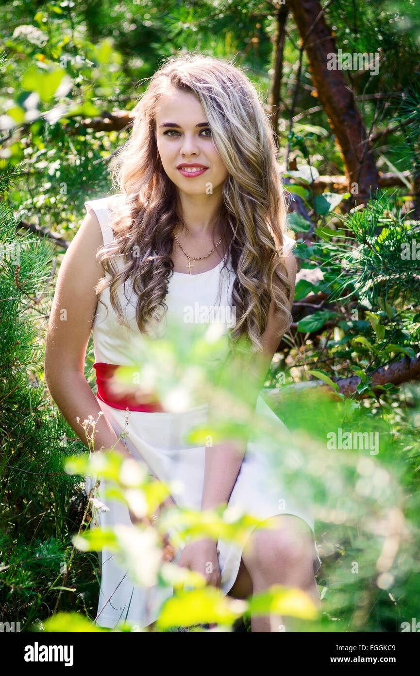 Summer photo smiling girl in a white dress Stock Photo - Alamy