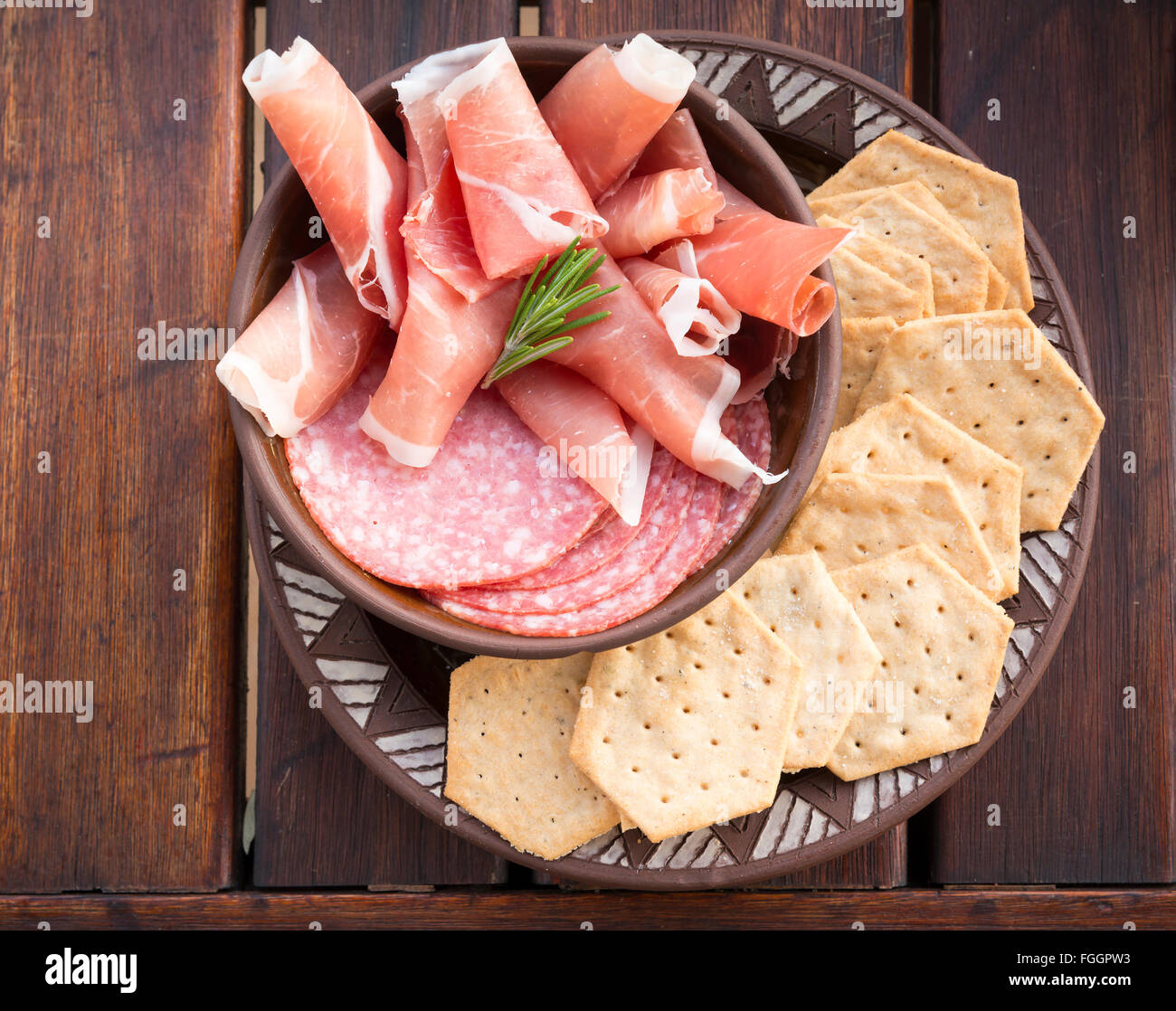 Classic antipasto food platters typical of the Mediterranean including ...