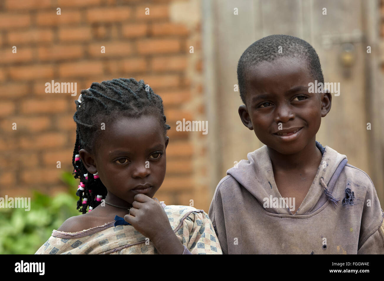 Sombre looking brother and sister, Uganda. Stock Photo