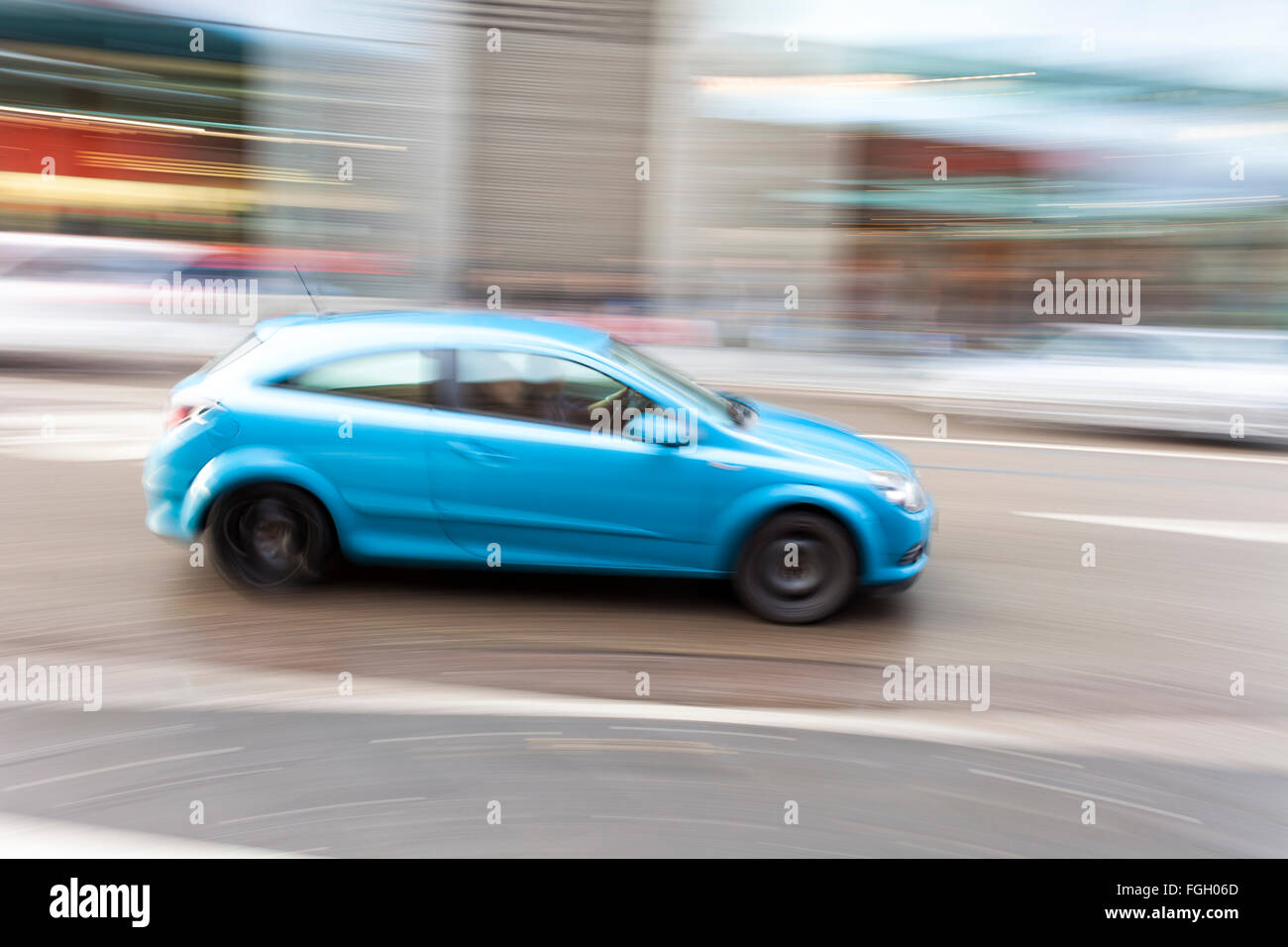 Car driving fast city hi-res stock photography and images - Alamy
