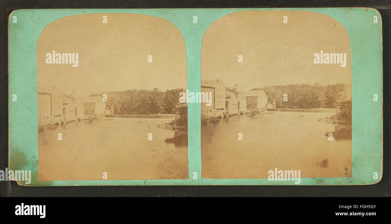 A photograph by Windsor's Photographic House showing the Upper Falls and Slater Mills, capturing the power of the waterfall and the industrial structures nearby. Stock Photo
