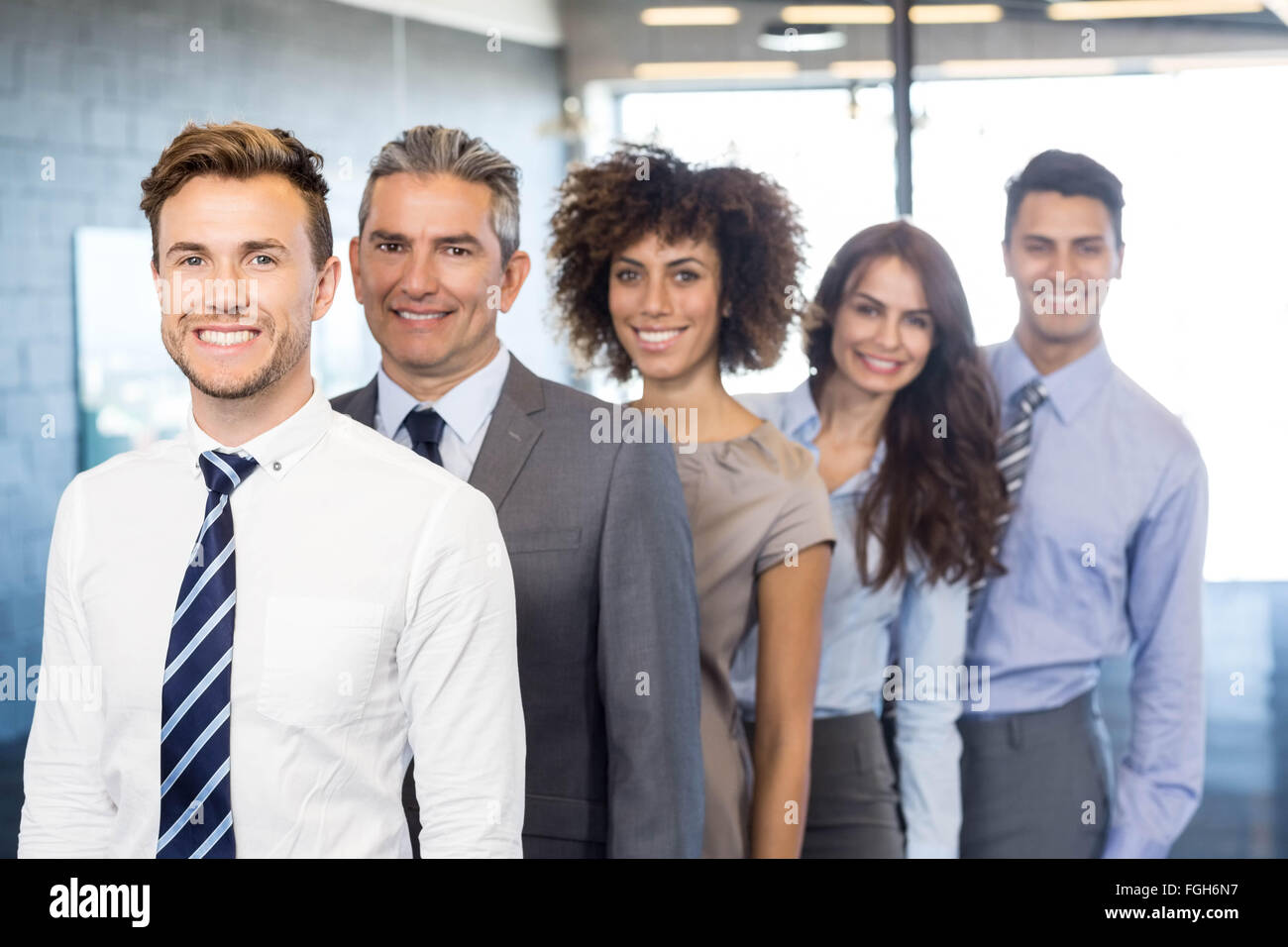 Portrait of confident business team Stock Photo - Alamy