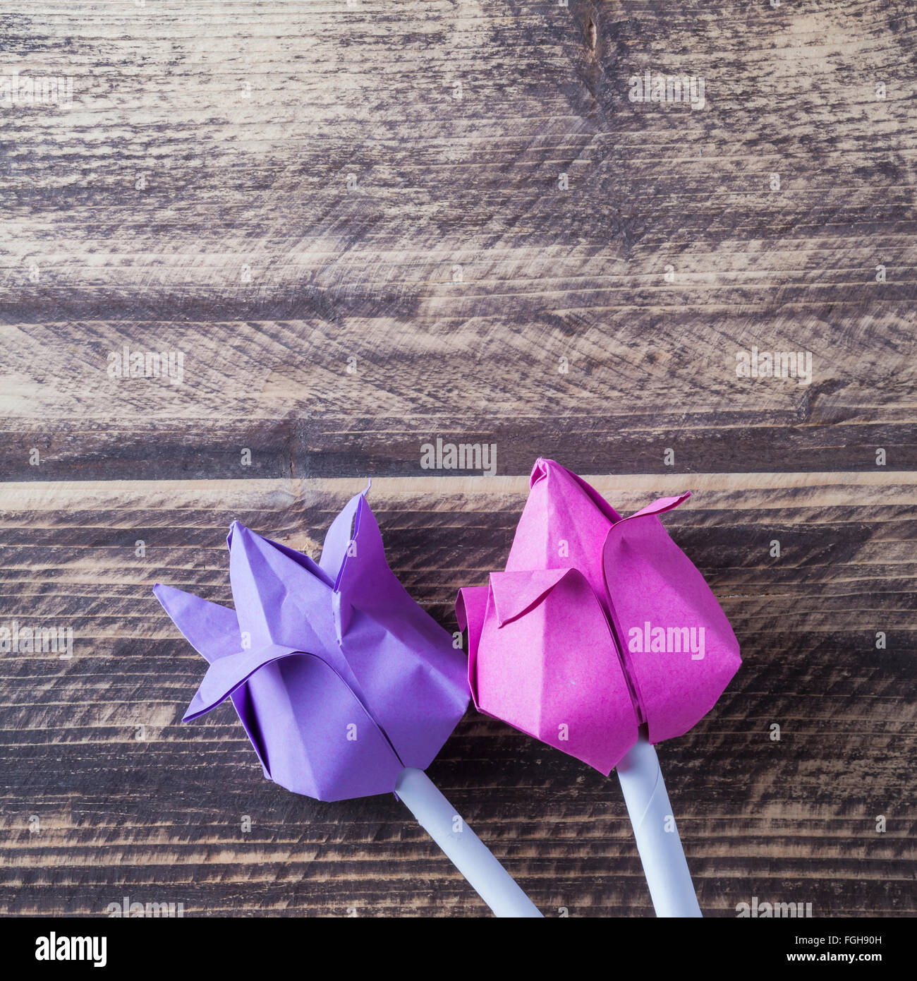 paper tulip on wooden table concept copy space Stock Photo