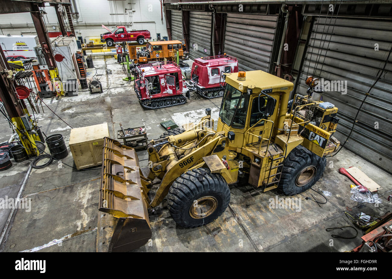 Inside the heavy equipment maintenance facillity at McMurdo Station, Antarctica. Stock Photo