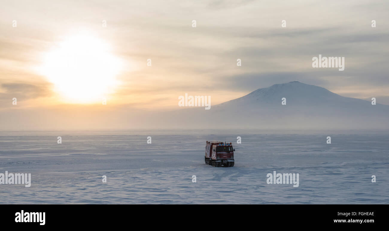 A Hagglunds vehicle on the sea ice of McMurdo Sound, Antarctica. Stock Photo