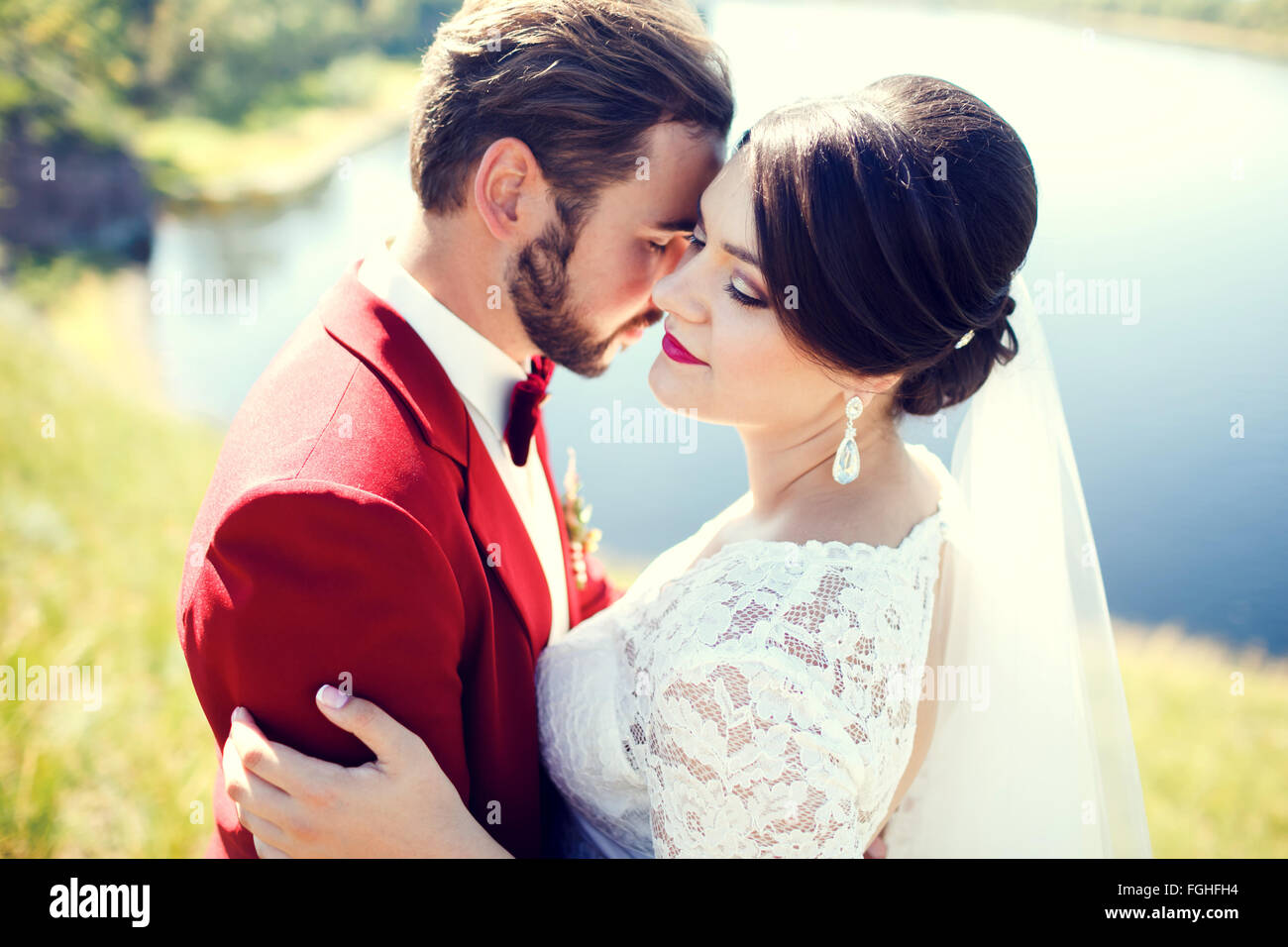 Bride and groom, lovely couple, wedding ceremony. Stylish man with mustache. Stock Photo