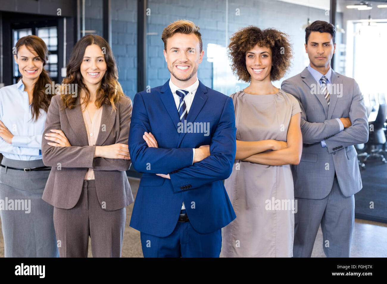Portrait of confident business team in office Stock Photo - Alamy