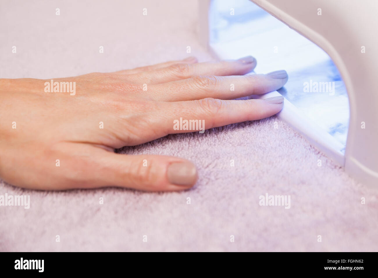 Customer drying their painted nails Stock Photo Alamy