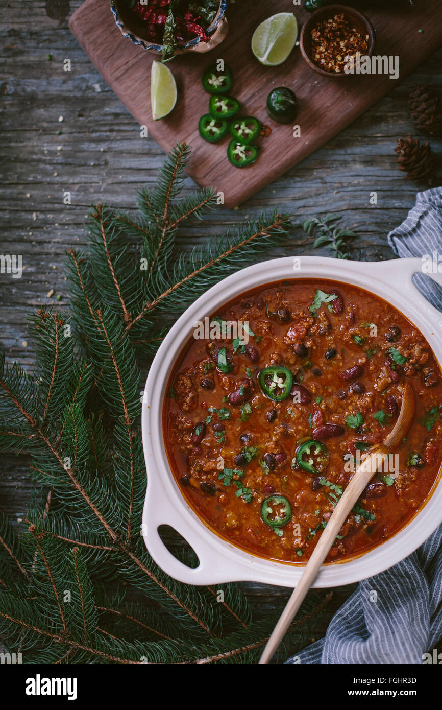 A big pot of turkey and bean chili is photographed from the top. Stock Photo
