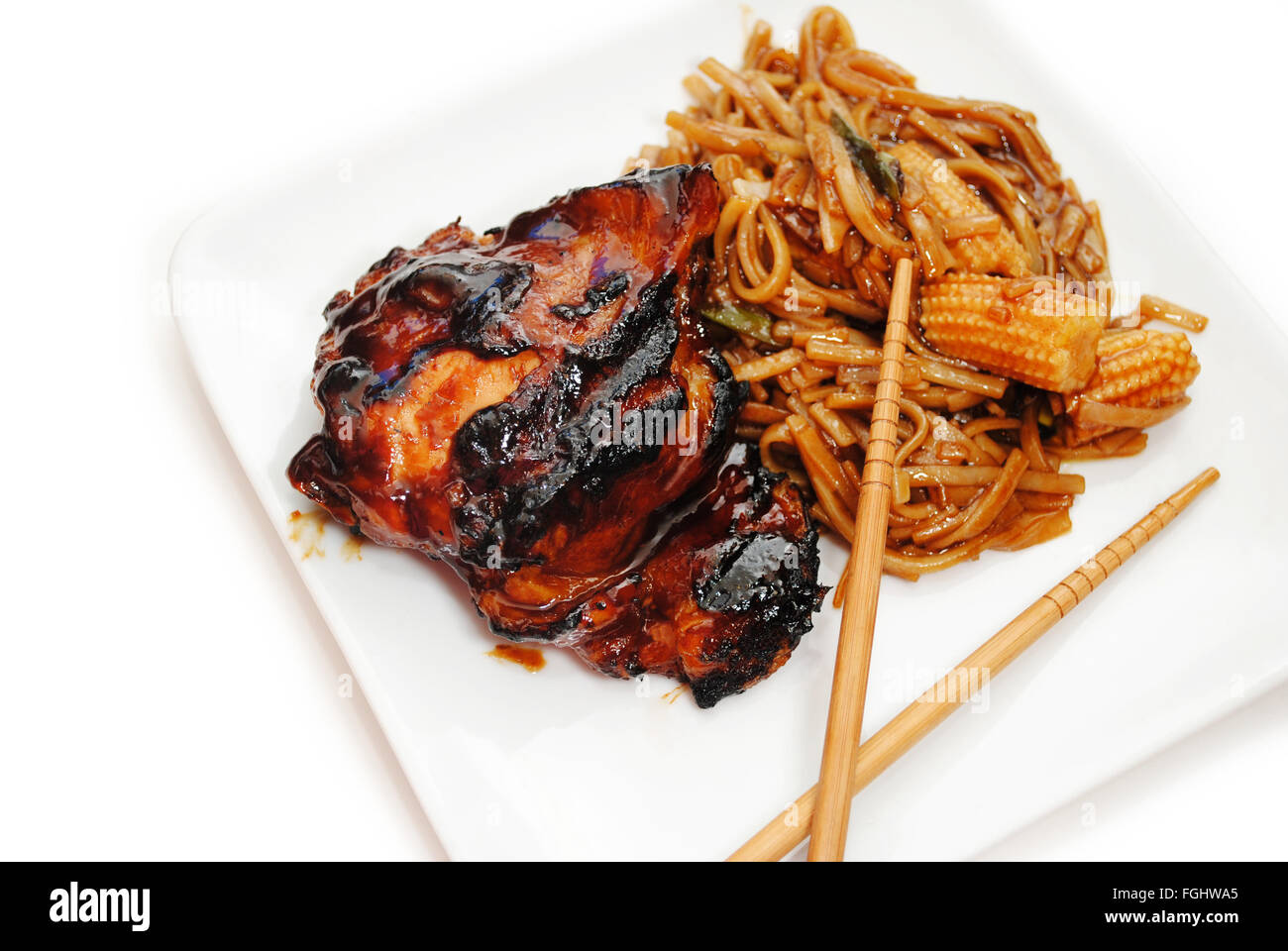 Chinese Vegetables and Noodles with Barbequed Chicken Stock Photo