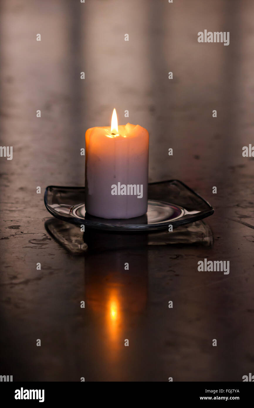 Single candle burning hires stock photography and images Alamy