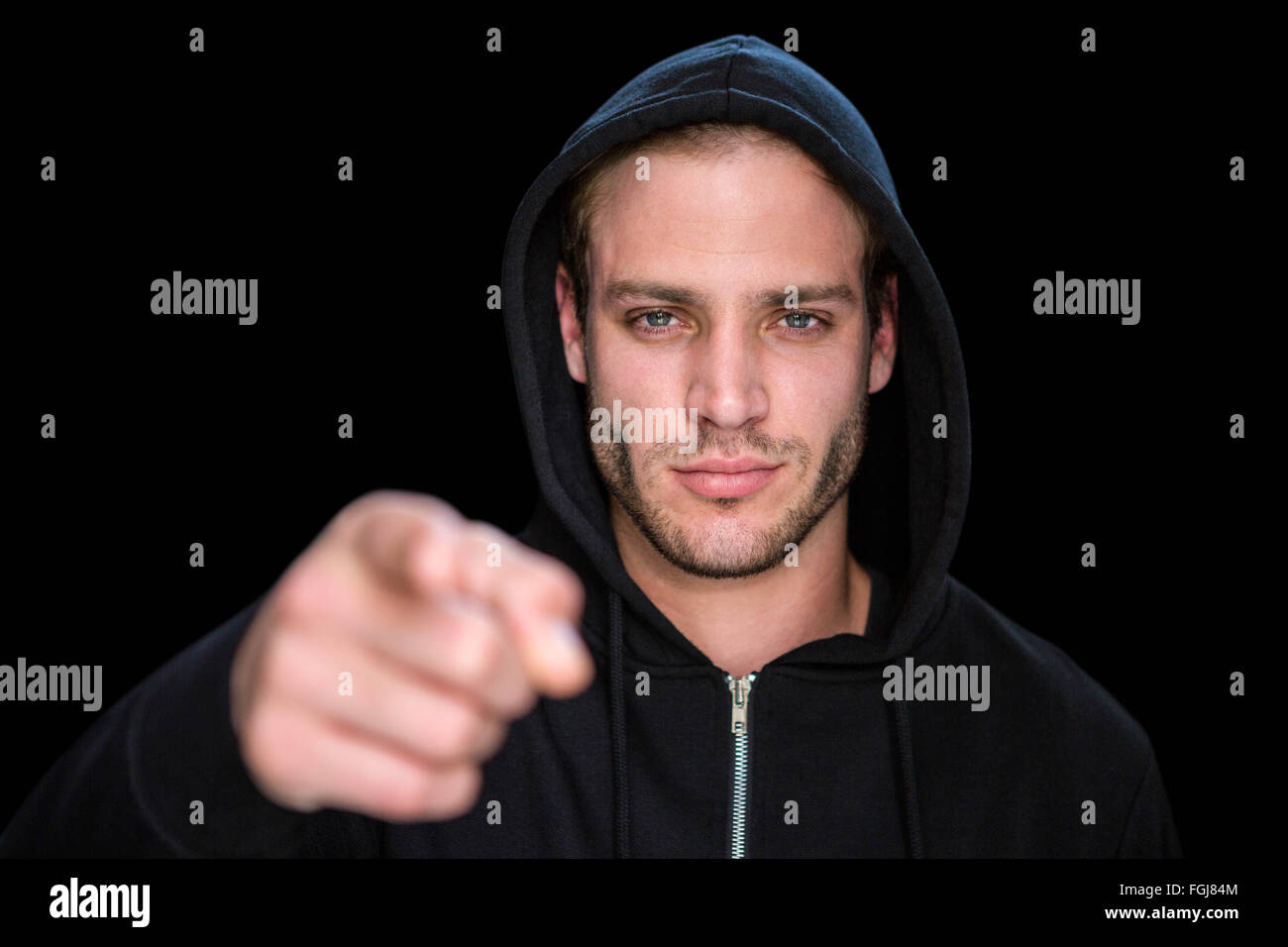 Handsome man wearing a black hoodie Stock Photo