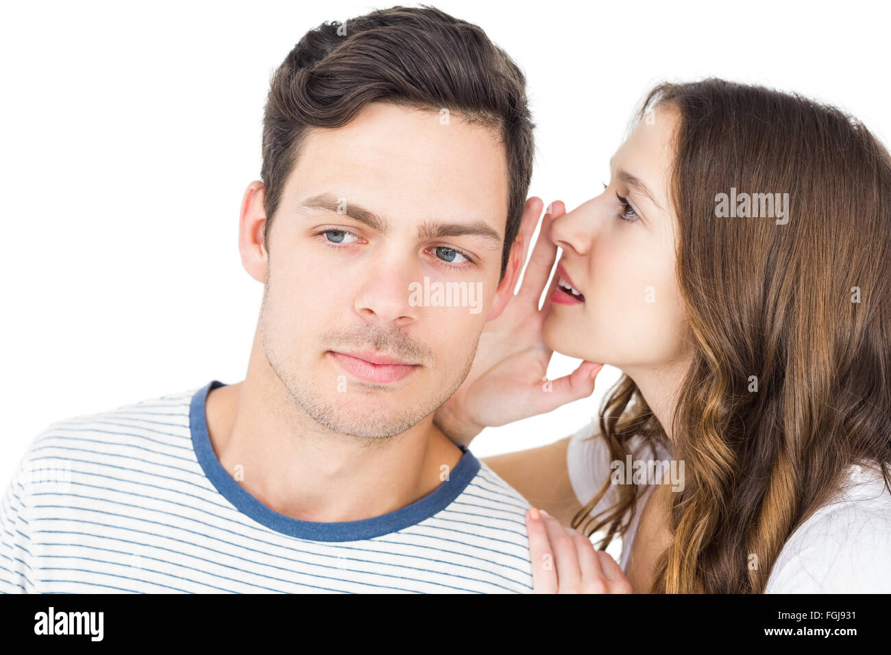 Young couple sharing a secret Stock Photo Alamy Young couple sharing a secret Stock Photo Alamy