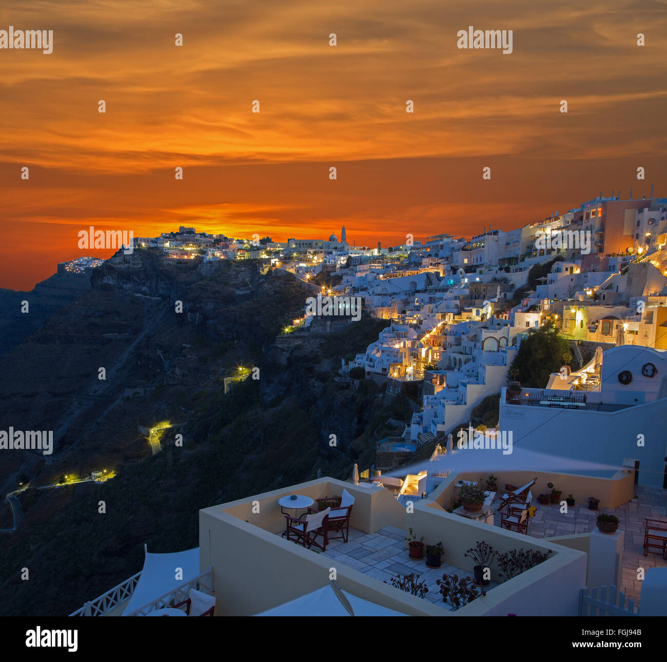 SANTORINI, GREECE - OCTOBER 6, 2015: The Fira at morning dusk and the Firostefani Stock Photo