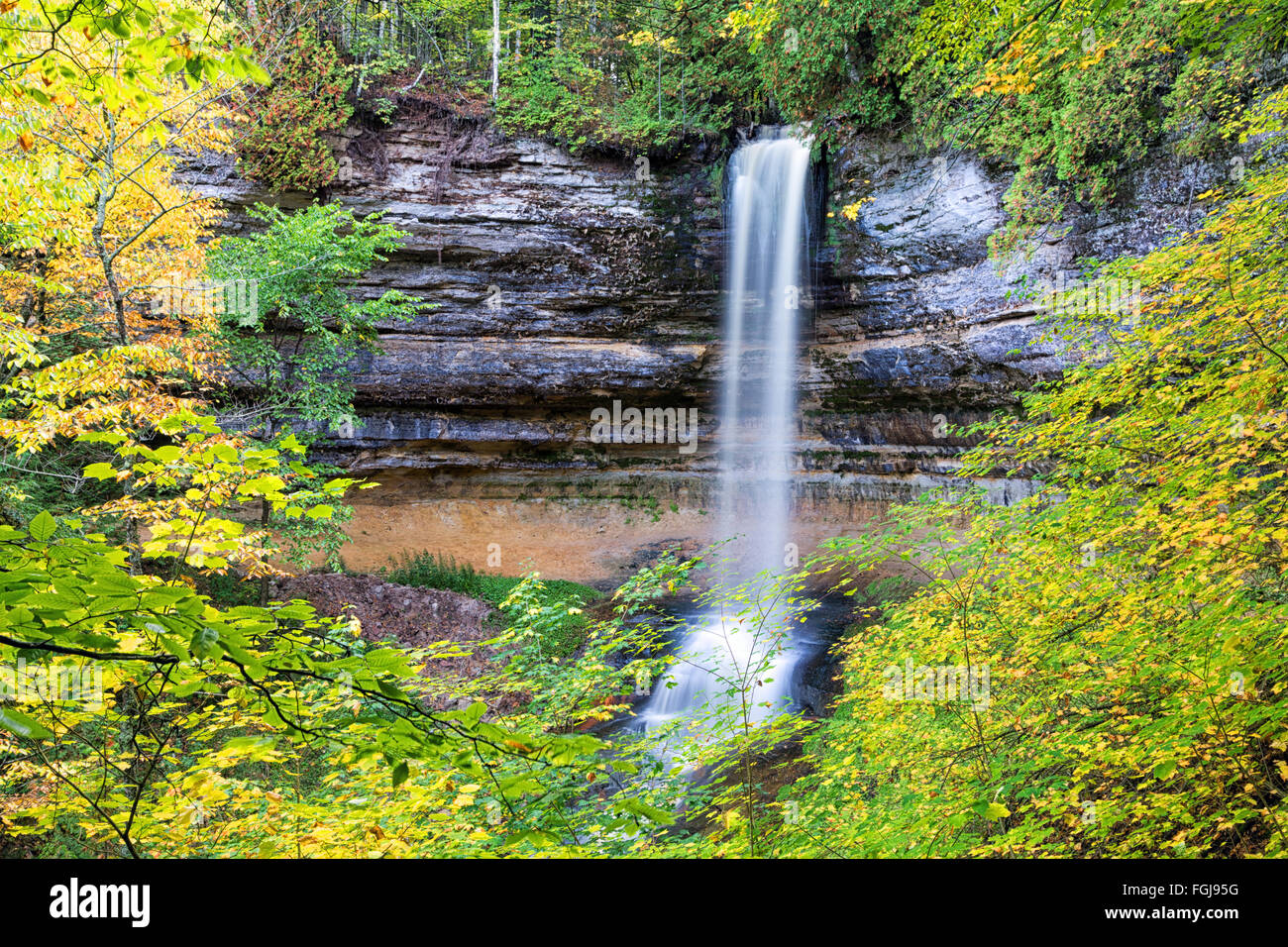 Miners Falls framed by autumn foliage. Just minutes away from downtown Munising Michigan, near Pictured Rocks Stock Photo