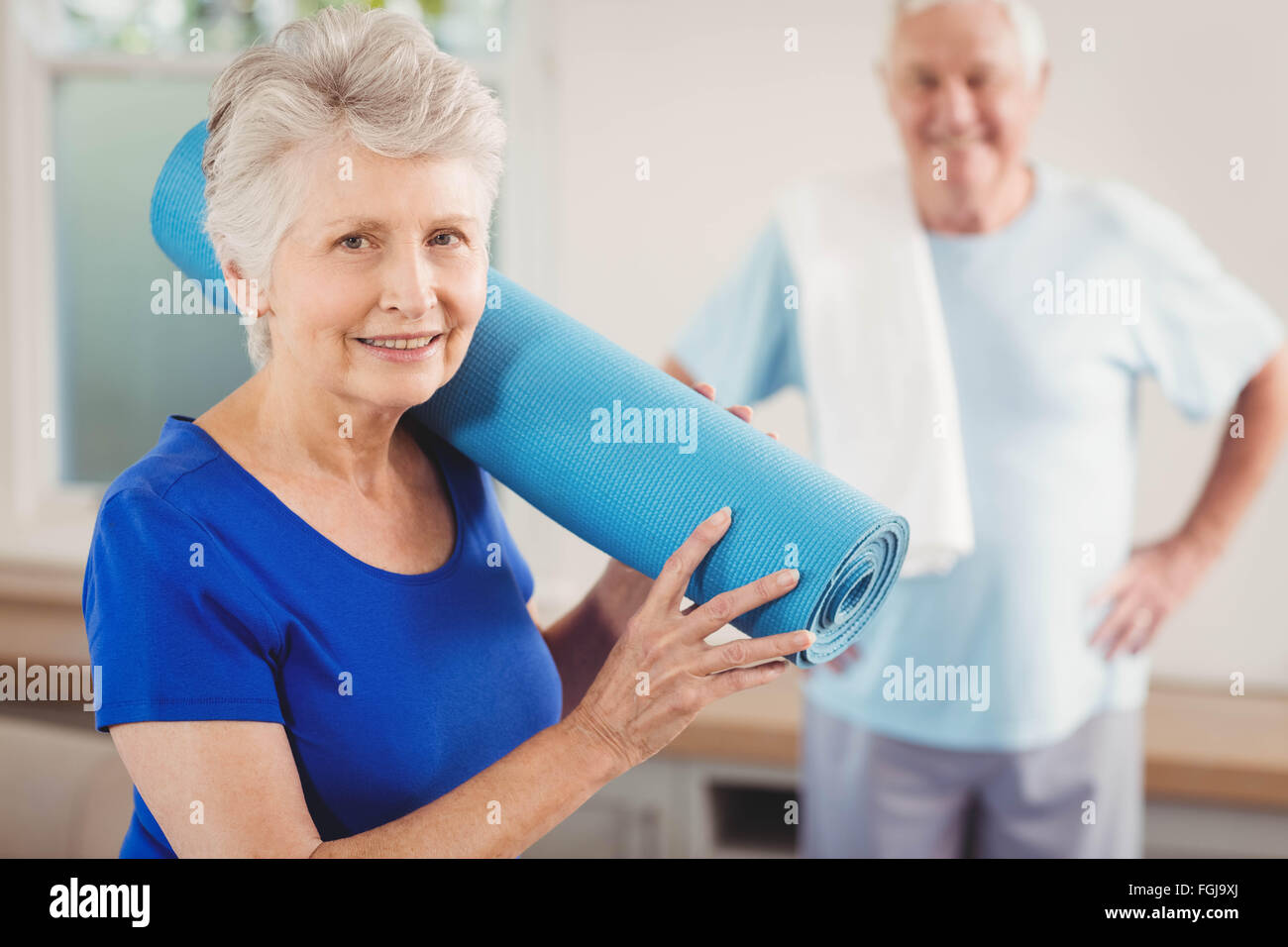 Senior couple packing up after workout Stock Photo Alamy