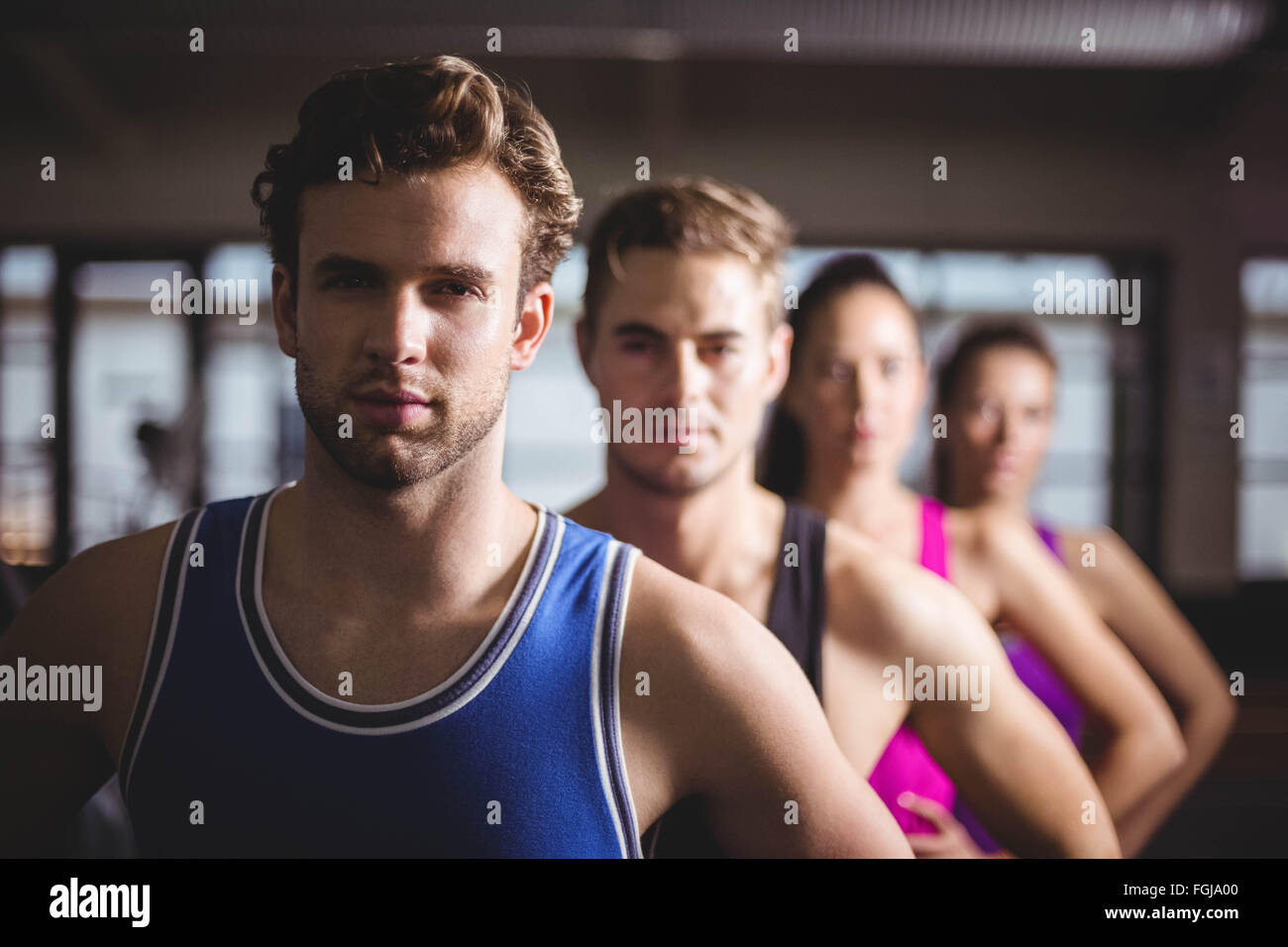 Fit people with hands on hips Stock Photo Alamy