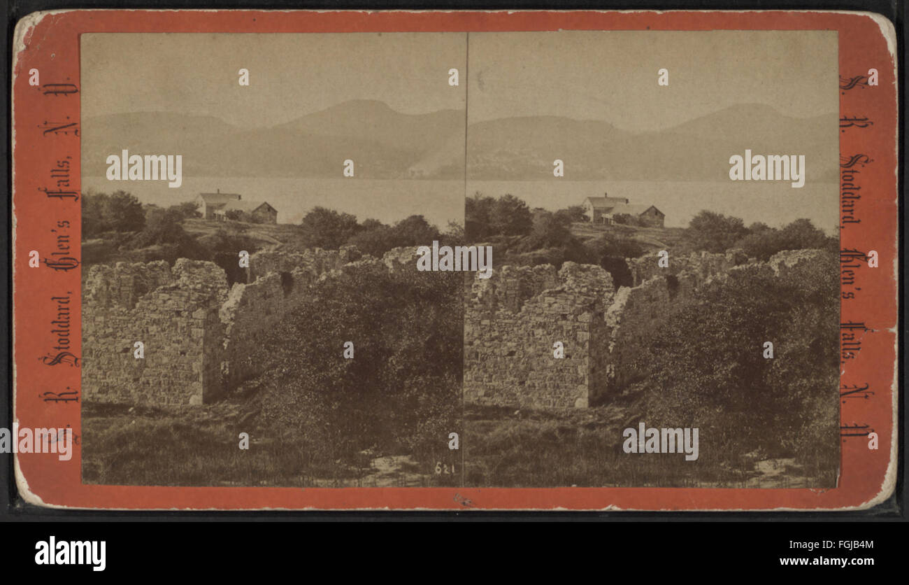 Seneca Ray Stoddard's photograph presents Port Henry from the ruins, capturing the remains of a furnace with the surrounding landscape, reflecting the region's industrial history. Stock Photo